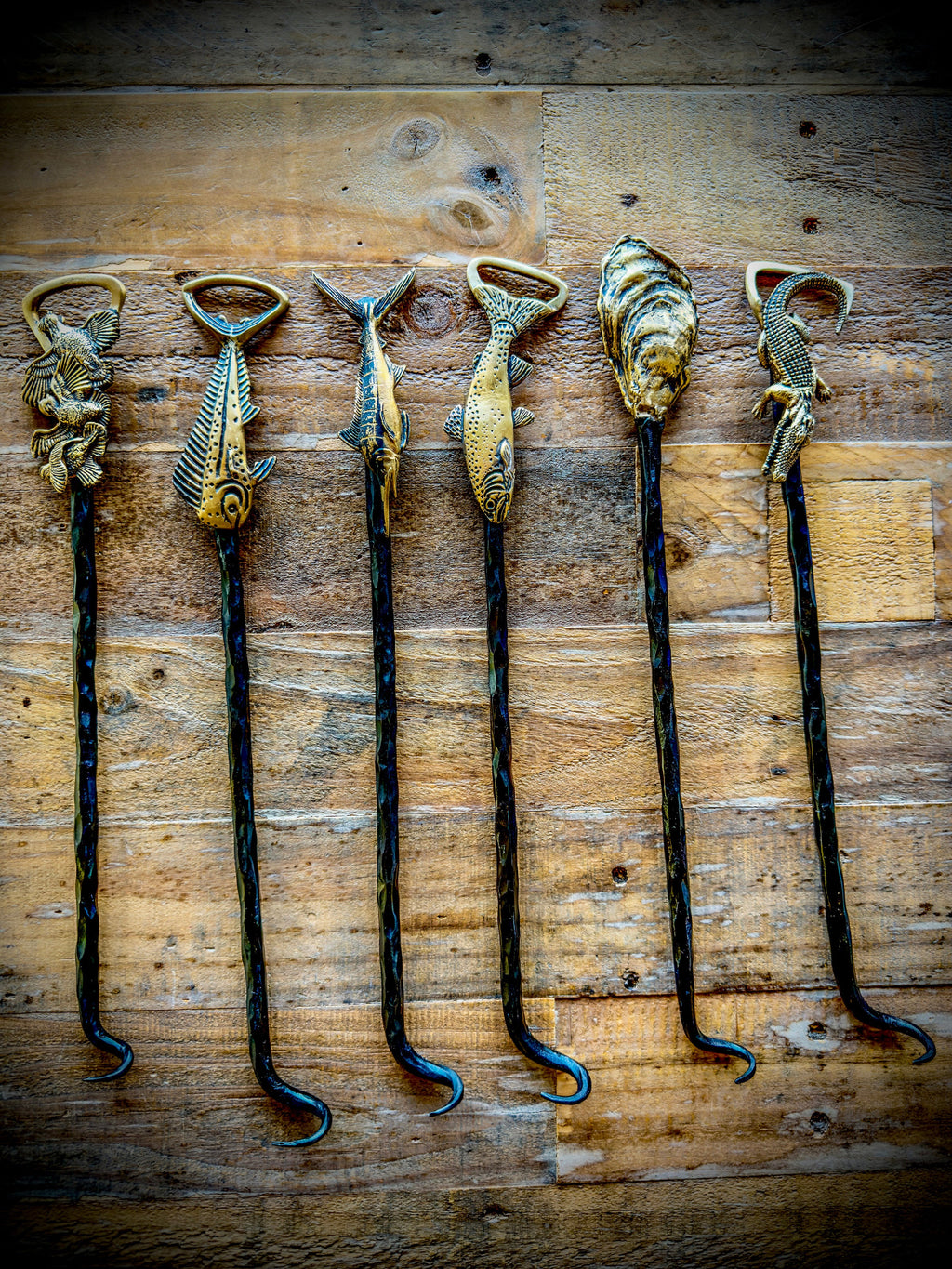 A set of HookNHide steak flippers.